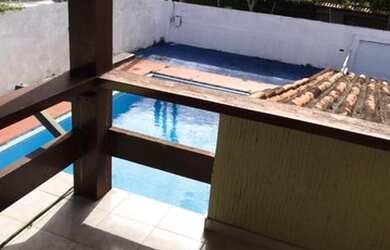 Imagem: A casa possui 3 Dormitórios, 2 Banheiros, 3 Vagas na garagem