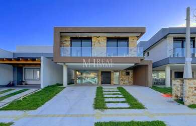 Imagem: A casa em condomínio possui 3 Dormitórios, 4 Banheiros, 2