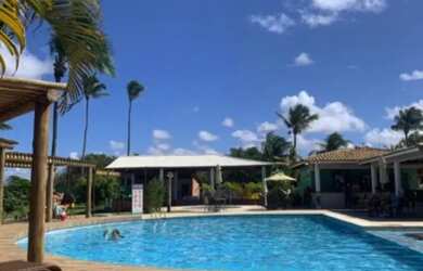 Imagem: A casa possui 3 Dormitórios, 2 Vagas na garagem e está localizado