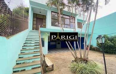 Imagem: A casa possui 4 Dormitórios, 2 Banheiros, 4 Vagas na garagem