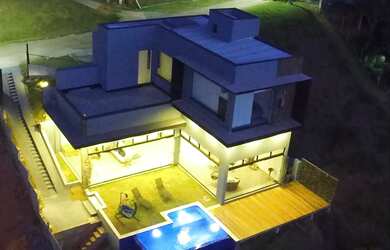 Imagem: A casa em condomínio possui 4 Dormitórios, 4 Banheiros, 4