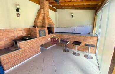 Imagem: A casa possui 3 Dormitórios, 5 Banheiros, 5 Vagas na garagem