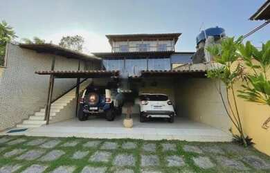 Imagem: A casa possui 5 Dormitórios, 4 Banheiros, 4 Vagas na garagem