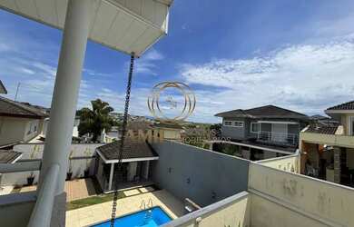 Imagem: A casa em condomínio possui 4 Dormitórios, 5 Banheiros, 2