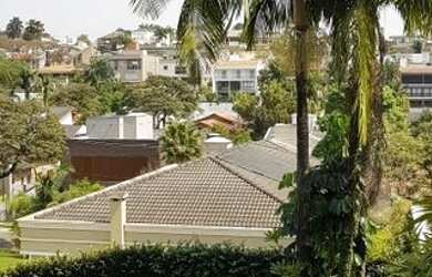 Imagem: A casa possui 3 Dormitórios, 4 Banheiros, 4 Vagas na garagem