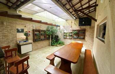 Imagem: A casa em condomínio possui 4 Dormitórios, 4 Banheiros, 120m²