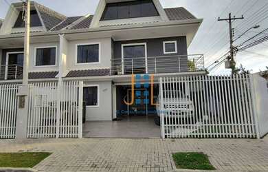 Imagem: A casa possui 4 Dormitórios, 2 Banheiros, 2 Vagas na garagem