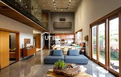 Imagem: A casa possui 4 Dormitórios, 5 Banheiros, 4 Vagas na garagem