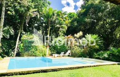 Imagem: A casa possui 5 Dormitórios, 5 Banheiros, 5 Vagas na garagem