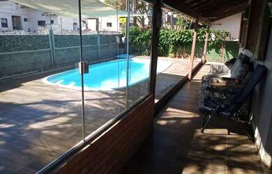 Imagem: A casa à venda possui 3 Dormitórios, 2 Banheiros, 3 Vagas