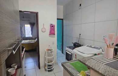 Imagem: A casa possui 2 Dormitórios, 2 Banheiros e está localizado