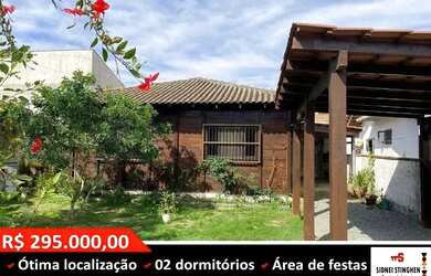 Imagem: A casa possui 2 Dormitórios, 1 Banheiro, 3 Vagas na garagem