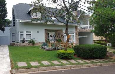 Imagem: A casa em condomínio possui 4 Dormitórios, 5 Banheiros, 5