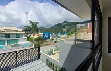 Imagem: A casa possui 3 Dormitórios, 1 Banheiro, 1 Vaga na garagem