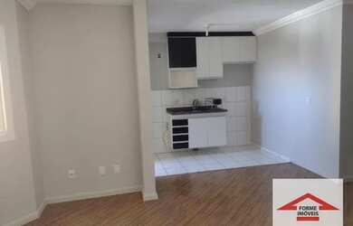 Imagem: O apartamento possui 2 Dormitórios, 1 Banheiro, 1 Vaga na garagem