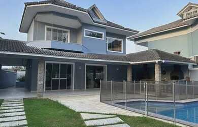 Imagem: A casa em condomínio possui 4 Dormitórios, 5 Banheiros, 3