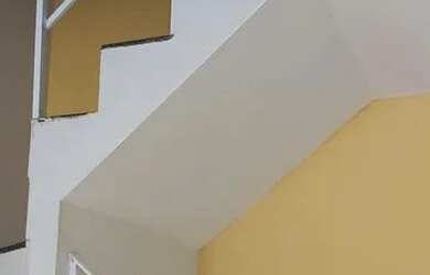 Imagem: A casa possui 2 Dormitórios, 3 Banheiros e 2 Vagas na garagem