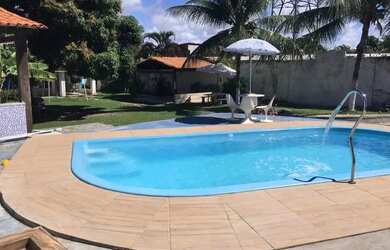 Imagem: A casa possui 5 Dormitórios, 5 Vagas na garagem e está localizado