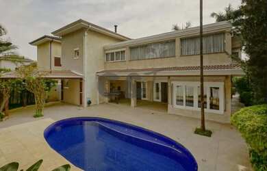 Imagem: A casa em condomínio possui 4 Dormitórios, 5 Banheiros, 4