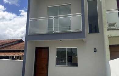 Imagem: A casa possui 2 Dormitórios, 2 Banheiros, 1 Vaga na garagem