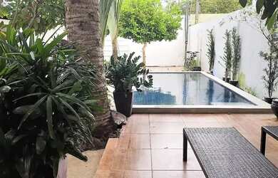 Imagem: A casa possui 2 Dormitórios, 3 Banheiros, 3 Vagas na garagem