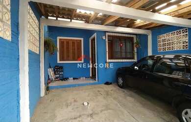 Imagem: A casa possui 5 Dormitórios, 2 Banheiros, 2 Vagas na garagem