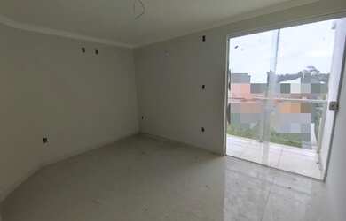 Imagem: A casa possui 3 Dormitórios, 3 Banheiros, 2 Vagas na garagem