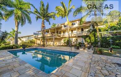 Imagem: A casa em condomínio possui 5 Dormitórios, 4 Banheiros, 5