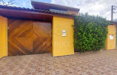 Imagem: A casa possui 5 Dormitórios, 5 Banheiros, 4 Vagas na garagem