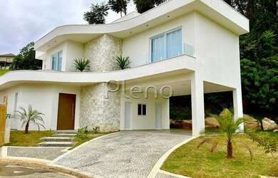 Imagem: A casa em condomínio possui 4 Dormitórios, 5 Banheiros, 4