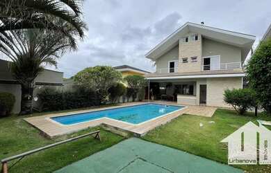 Imagem: A casa em condomínio possui 4 Dormitórios, 5 Banheiros, 4