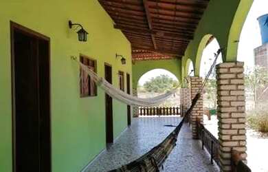 Imagem: A casa possui 5 Dormitórios, 5 Banheiros, 5 Vagas na garagem