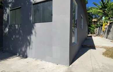 Imagem: A casa possui 3 Dormitórios, 3 Banheiros, 3 Vagas na garagem