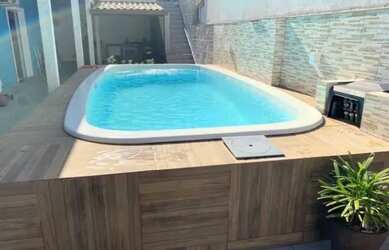 Imagem: A casa possui 3 Dormitórios, 2 Vagas na garagem e Imóvel novo