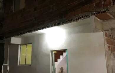 Imagem: A casa possui 3 Dormitórios, 2 Banheiros e está localizado