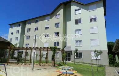 Imagem: O apartamento possui 2 Dormitórios, 1 Banheiro, 1 Vaga na garagem