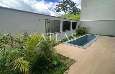 Imagem: A casa possui 3 Dormitórios, 4 Banheiros, 2 Vagas na garagem