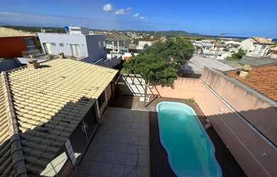 Imagem 1: 900m da Praia. Acomodam 12 pessoas, 5 Vagas na garageme4 Dormitórios