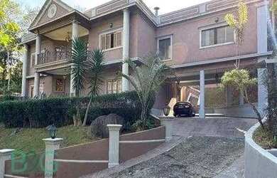 Imagem: A casa em condomínio possui 4 Dormitórios, 5 Banheiros, 5