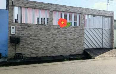 Imagem: A casa possui 3 Dormitórios, 2 Banheiros, 2 Vagas na garagem