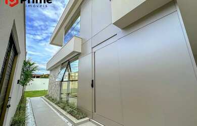 Imagem: A casa possui 3 Dormitórios, 3 Banheiros, 3 Vagas na garagem