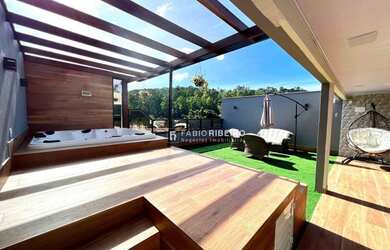 Imagem: A casa possui 3 Dormitórios, 4 Banheiros, 4 Vagas na garagem