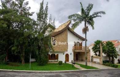 Imagem: A casa em condomínio possui 5 Dormitórios, 5 Banheiros, 2