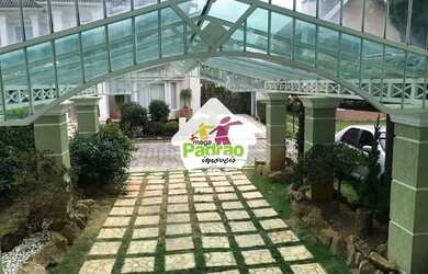 Imagem: A casa em condomínio possui 4 Dormitórios, 2 Banheiros, 3