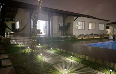 Imagem: A casa possui 5 Dormitórios, 4 Banheiros e está localizado