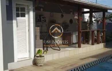 Imagem: A casa possui 3 Dormitórios, 3 Banheiros, 3 Vagas na garagem