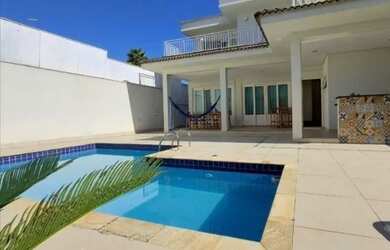 Imagem: A casa em condomínio possui 4 Dormitórios, 5 Banheiros, 2