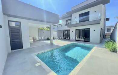 Imagem: A casa em condomínio possui 4 Dormitórios, 5 Banheiros, 4