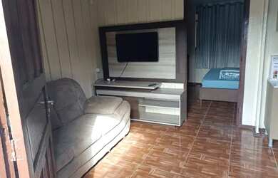 Imagem: A casa possui 2 Dormitórios, 1 Vaga na garagem e está localizado