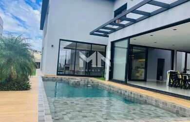 Imagem: A casa em condomínio possui 5 Dormitórios, 5 Banheiros, 4